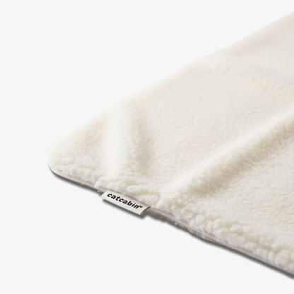 Couverture auto-chauffante pour chat